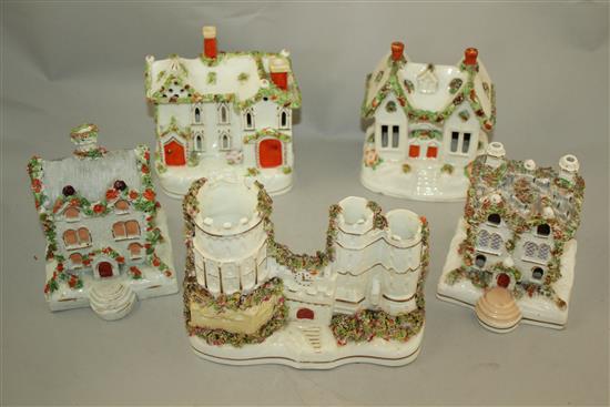 Five Staffordshire porcelain models of cottages and a castle, c.1840, 13.5 - 14cm